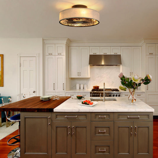 Modern kitchen with marble island, wooden countertop, and stainless steel appliances.