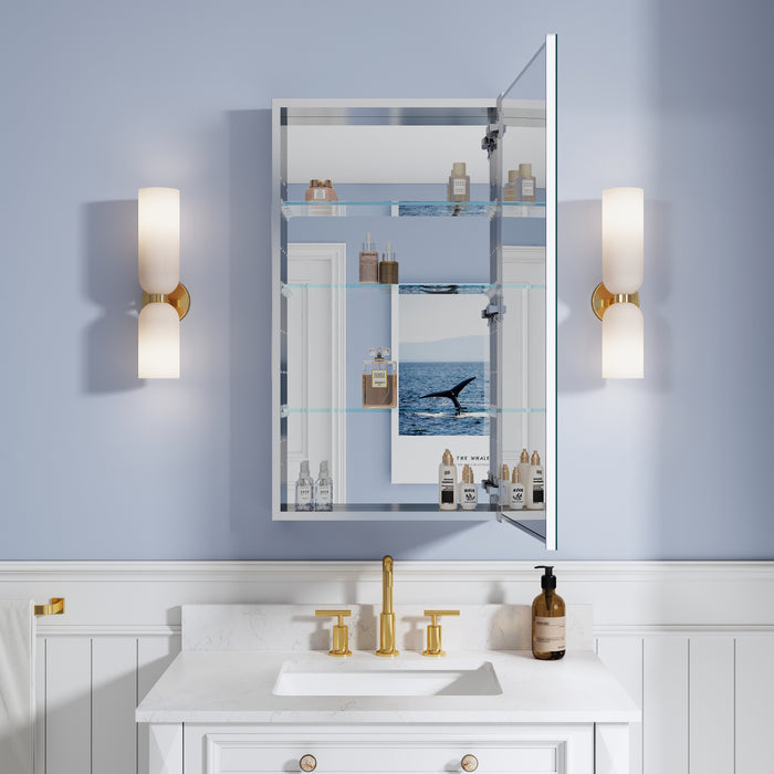 Bathroom vanity with mirror, lights, and toiletries against a light blue wall.