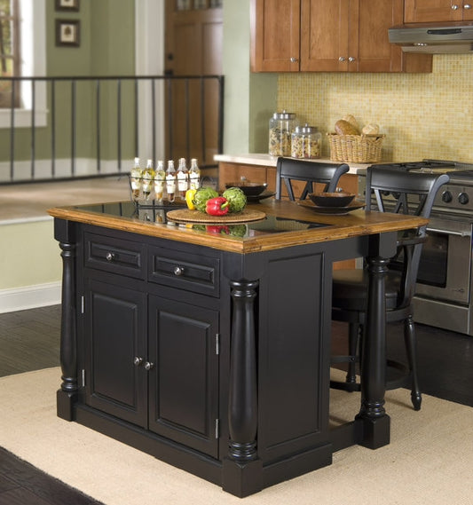 Black kitchen island with wooden top in a home setting