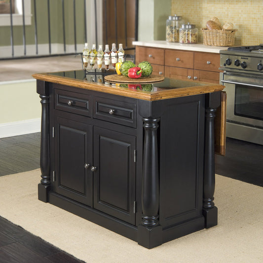 Black kitchen island with wooden top in a home setting