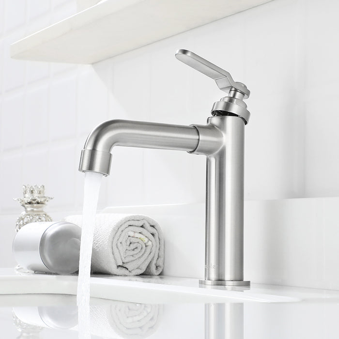 Stainless steel faucet on a white background