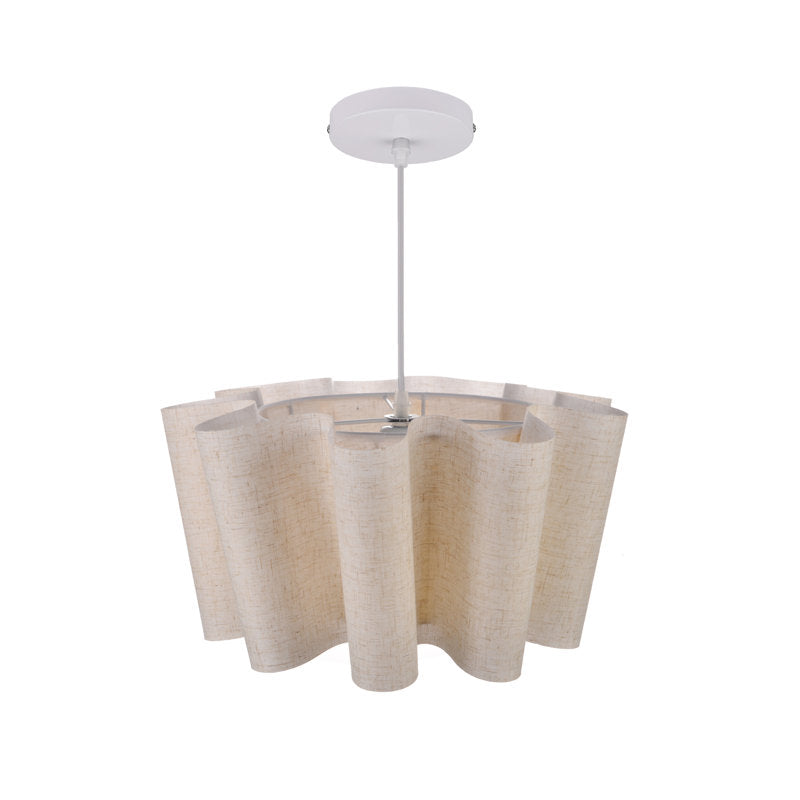 Beige pendant light with a white ceiling fixture on a white background