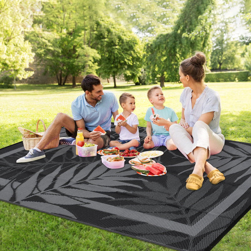 Modern 9 x 12 leaf pattern outdoor rug for indoor and outdoor patios and porches - Waterproof, washable, no shedding, and easy to clean