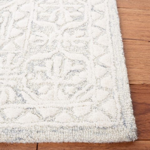 Tapis oriental Pezanetti en laine tuftée faite main, gris/ivoire. 122 x 183 cm.