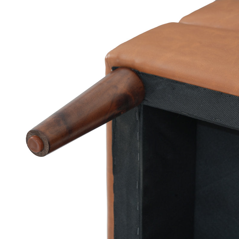 Luna padded footstool in faux leather with quilted pattern and solid wood legs