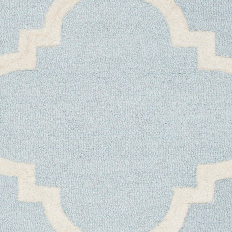 Tapis Cannen géométrique en laine tuftée à la main, bleu clair/ivoire, 90 x 150 cm
