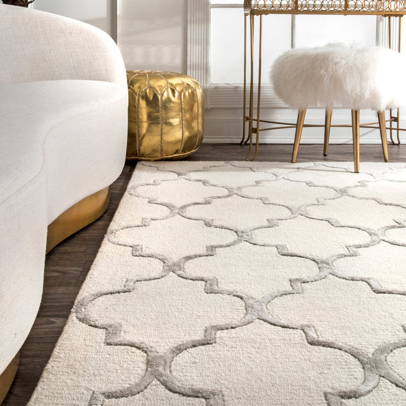 Tapis tufté main ivoire à motif géométrique Noirmont 152 x 244 cm